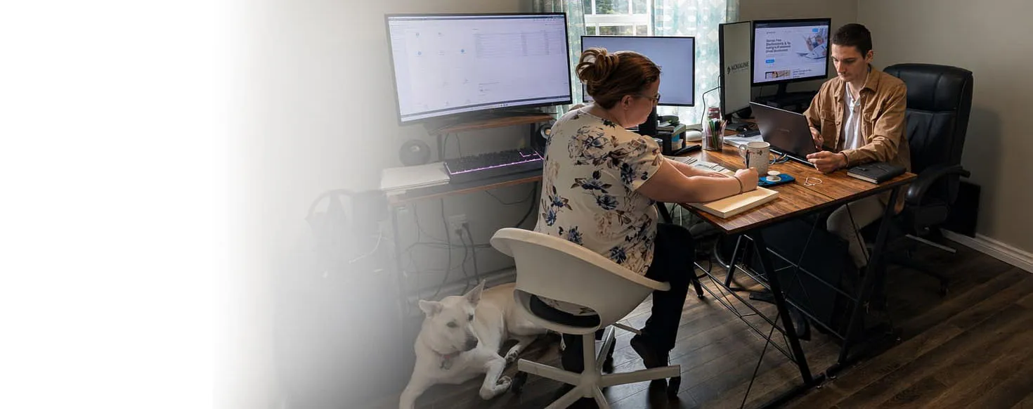 Nova Scotia accounting and tax professional reviewing financial records at a desk